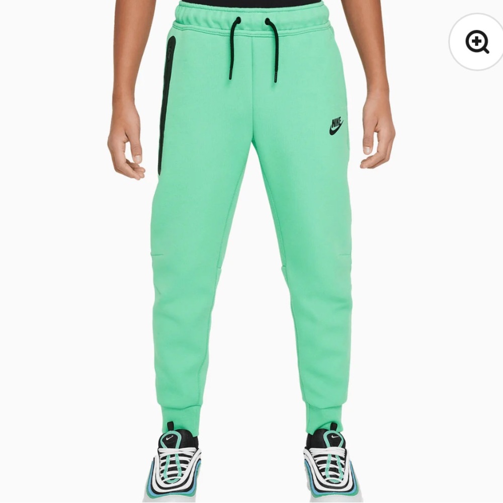 Nike Tech.  Mint color.  Youth L pants.  Small blemishes.